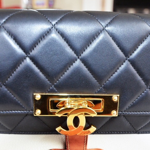CHANEL Handbags - CHANEL Lambskin Quilted Golden Class WOC